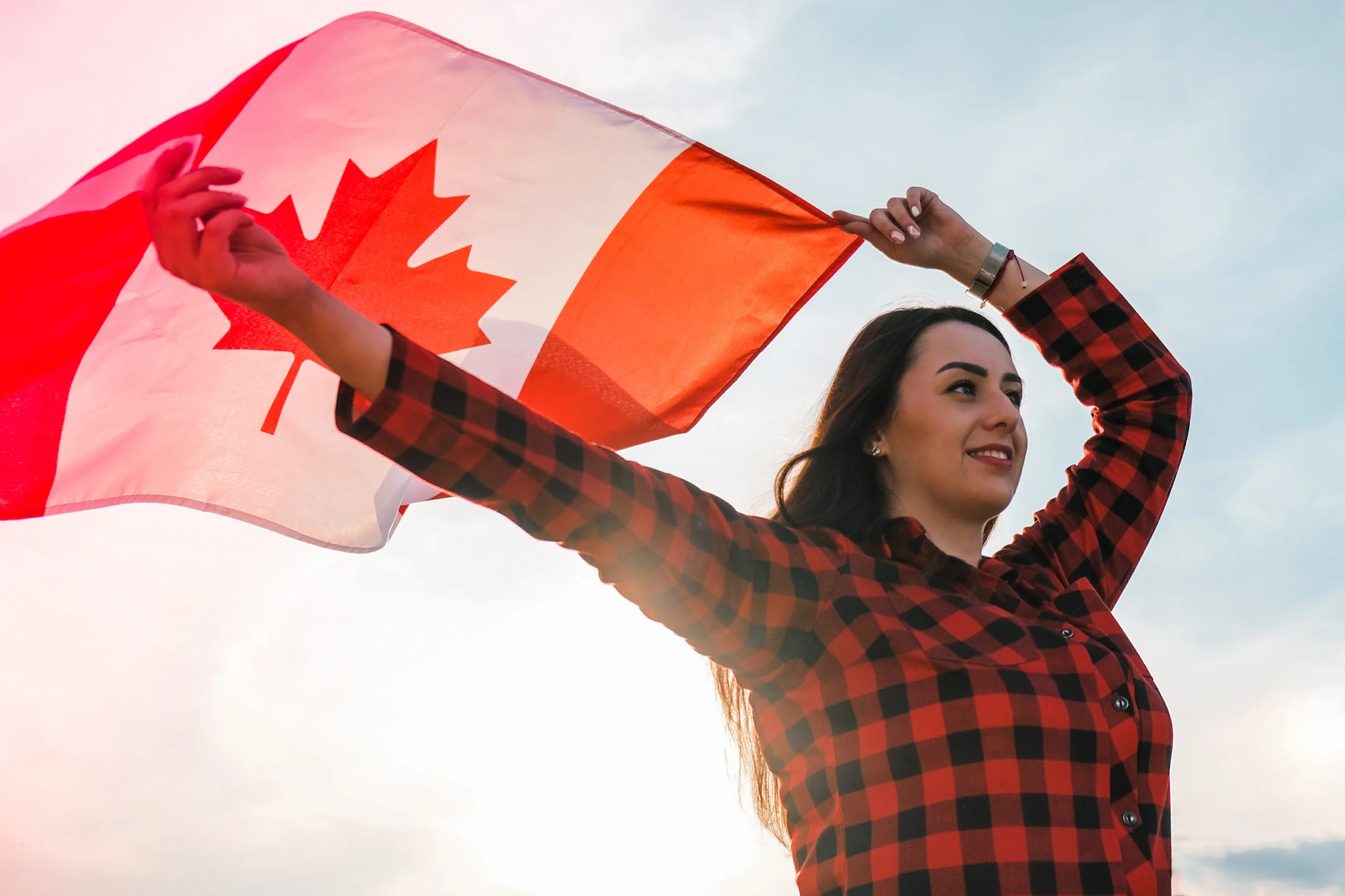 Young adults celebrating Canada Day — promoting liver health awareness across Canada.